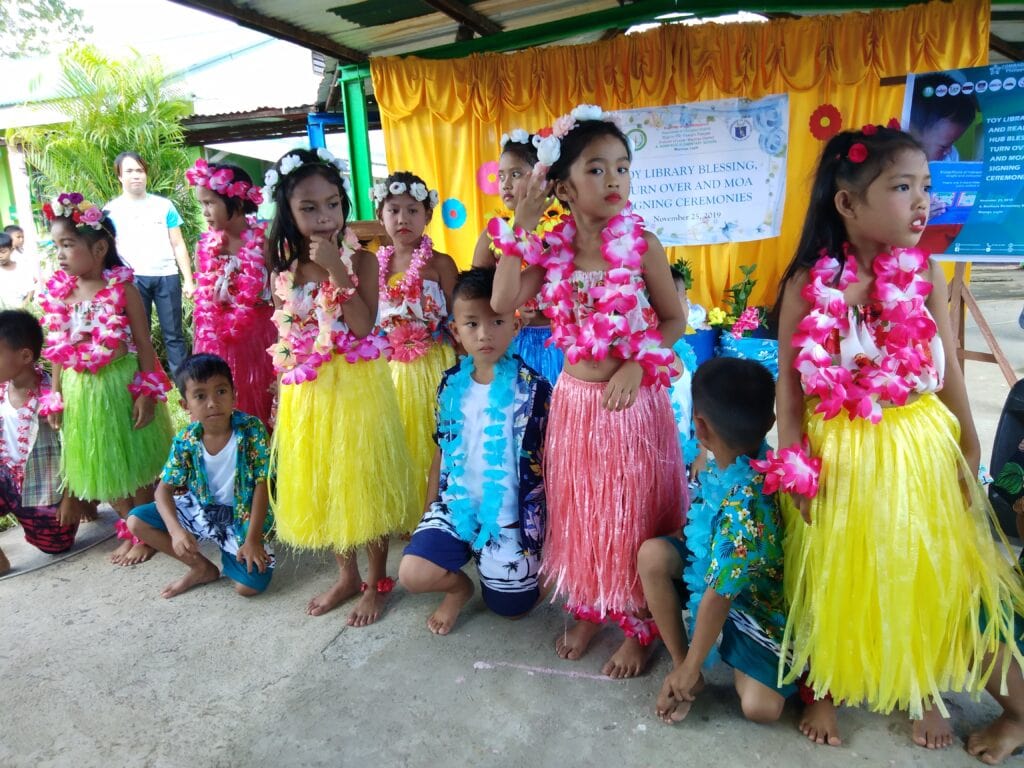 A group of children in their floral costume
